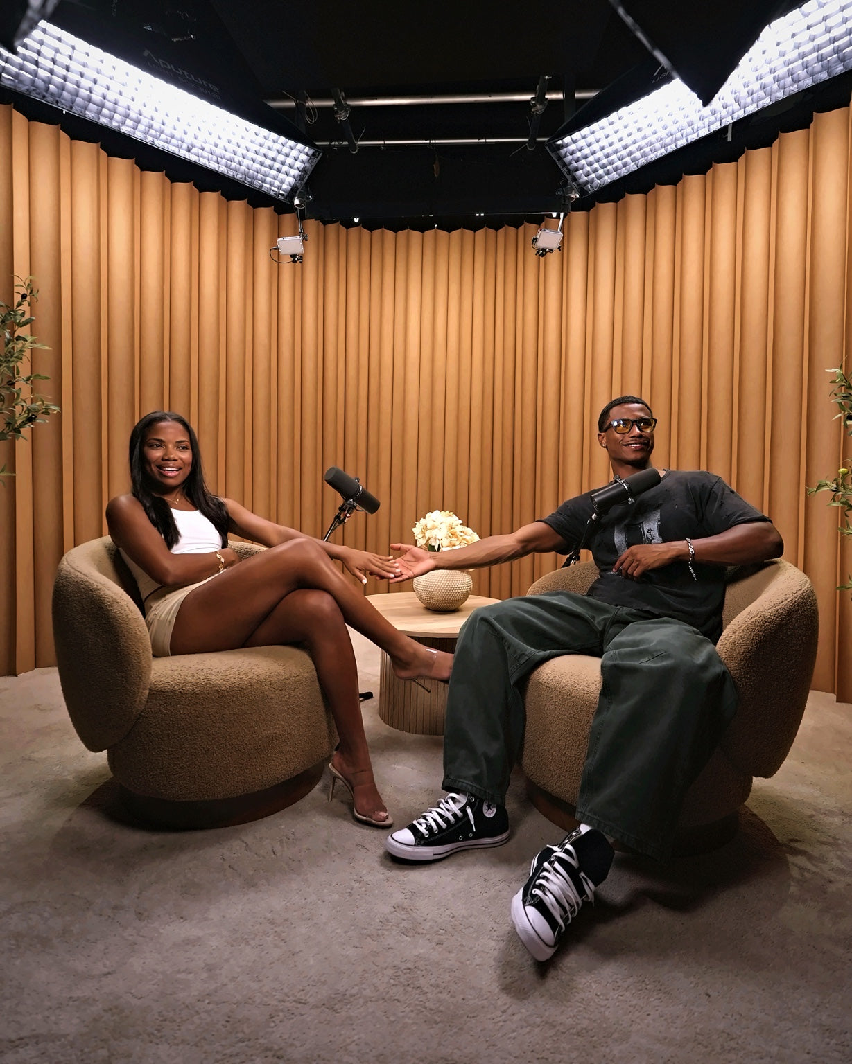 Kayla and DA in the podcast studio